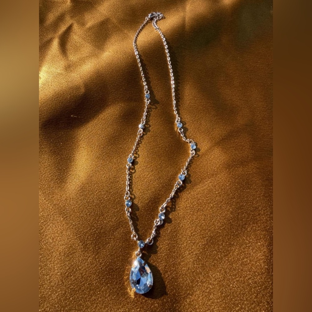 Delicate Silver Necklace with Blue Gem Accents